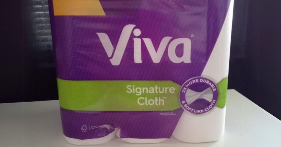 a 6 pack of viva paper towels on a white table top