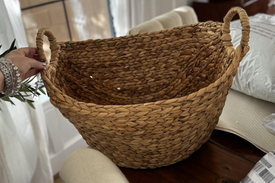 hand holding large boat basket 