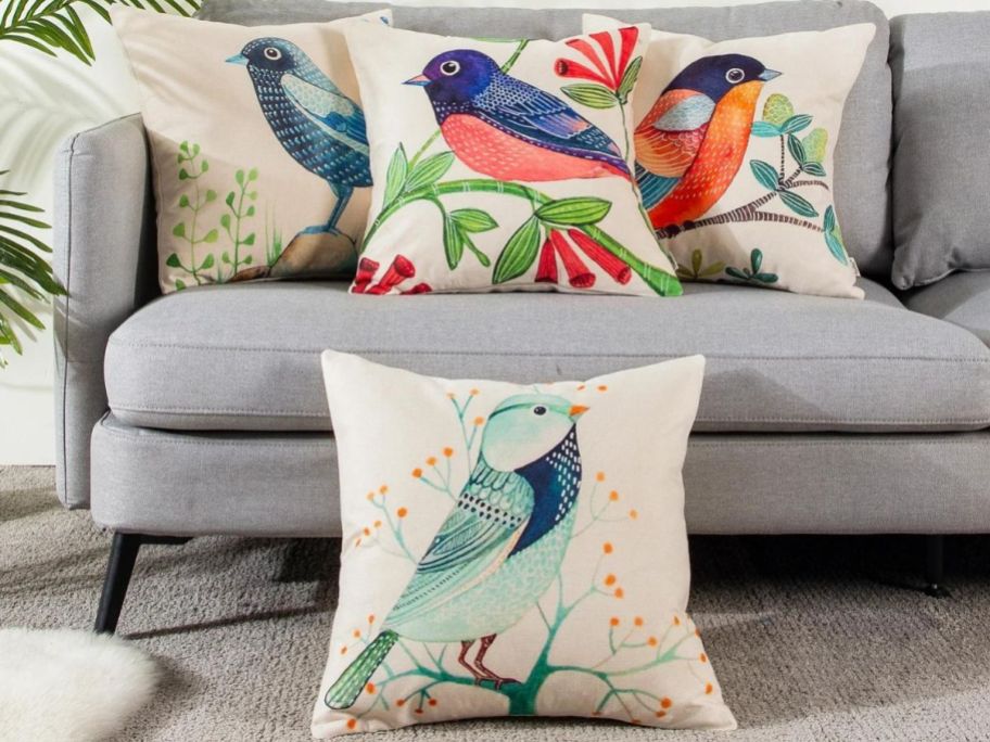 bird throw pillows on couch