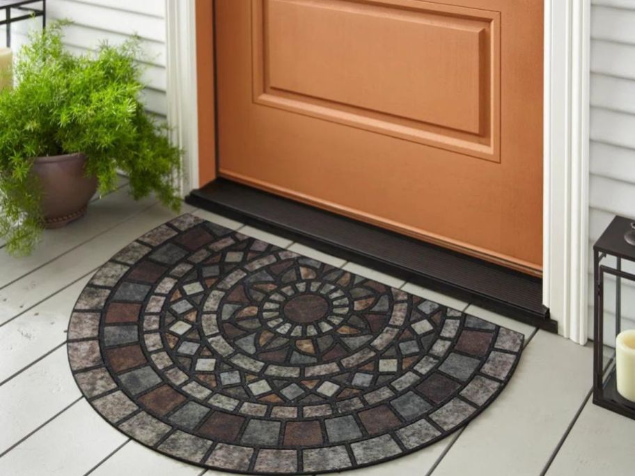 Geometric Outdoor Doormat in front of tan door