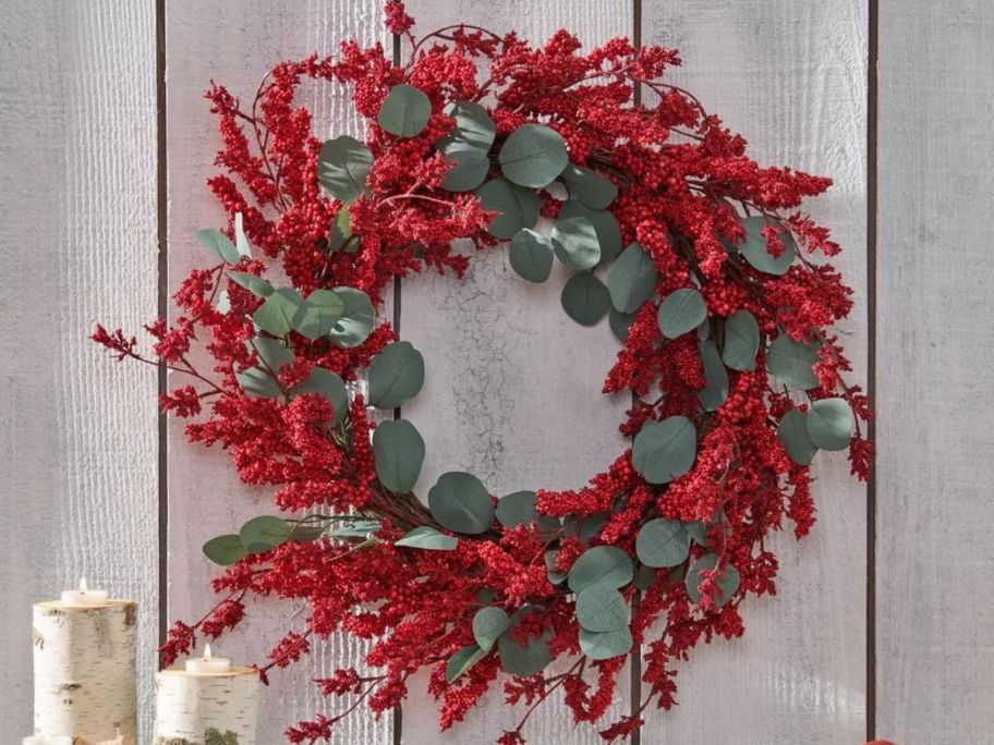 red and green Faux Polyester 29" Wreath on wall
