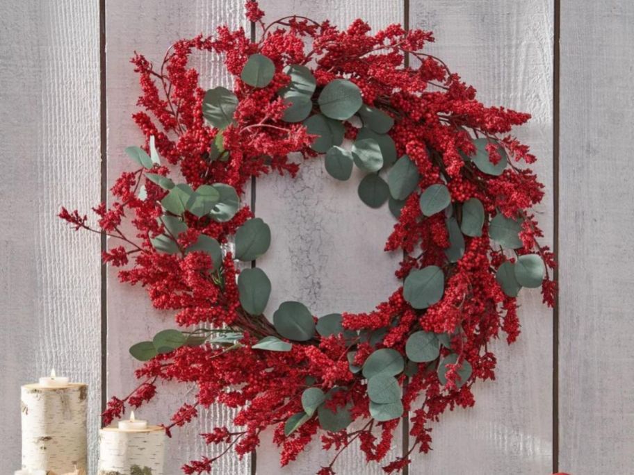 red and green Faux Polyester 29" Wreath on wall