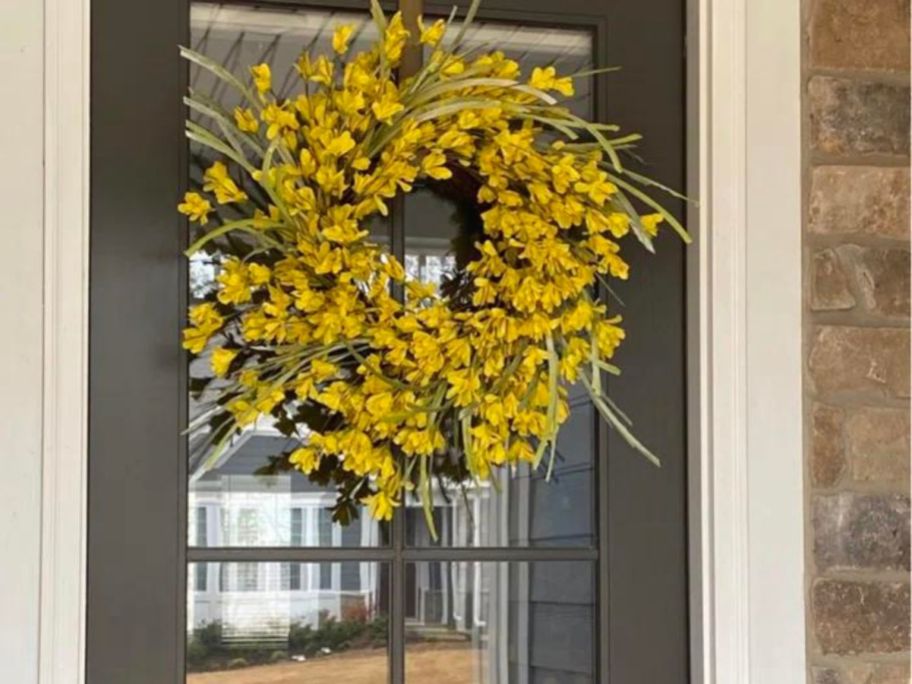 yellow wreath on door