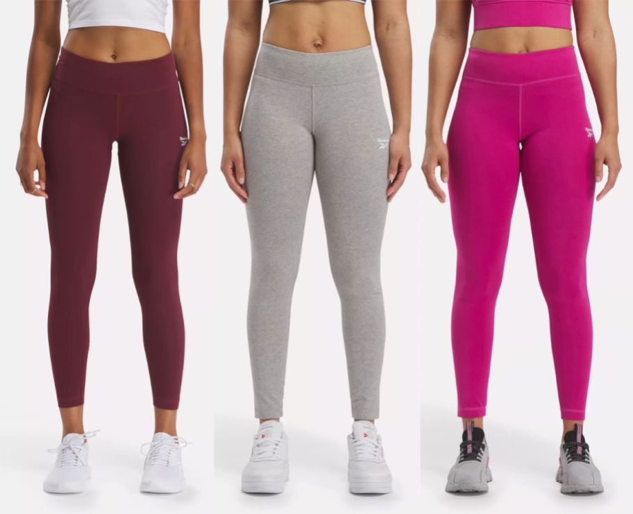 3 female models wearing workout tights in maroon heather gray and hot pink
