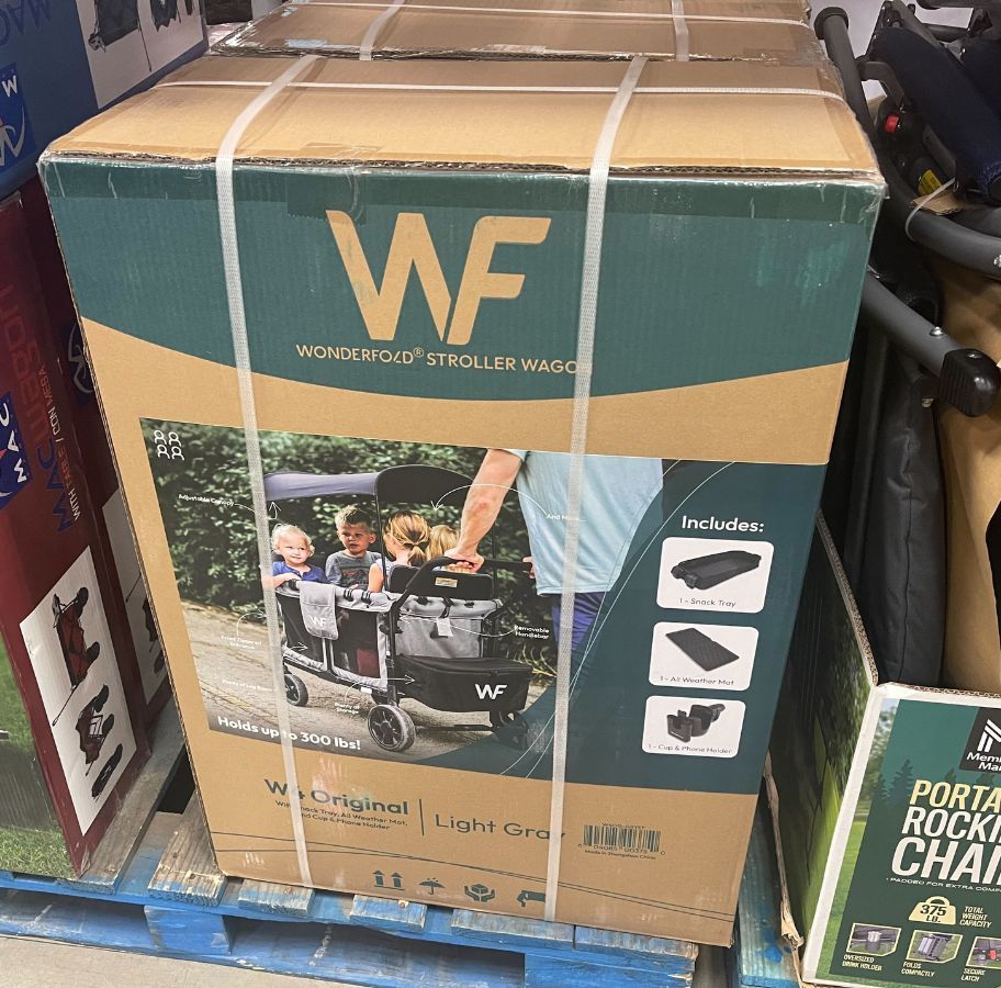a wonderfold w4 elite wagon box on a store aisle in a sams club