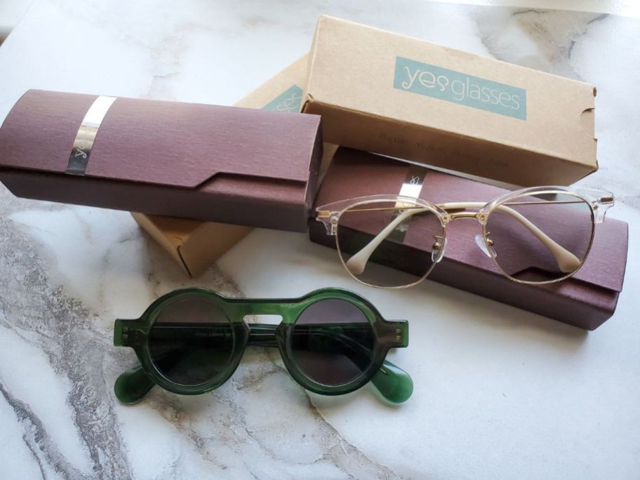 2  pairs of Yesglasses sunglasses