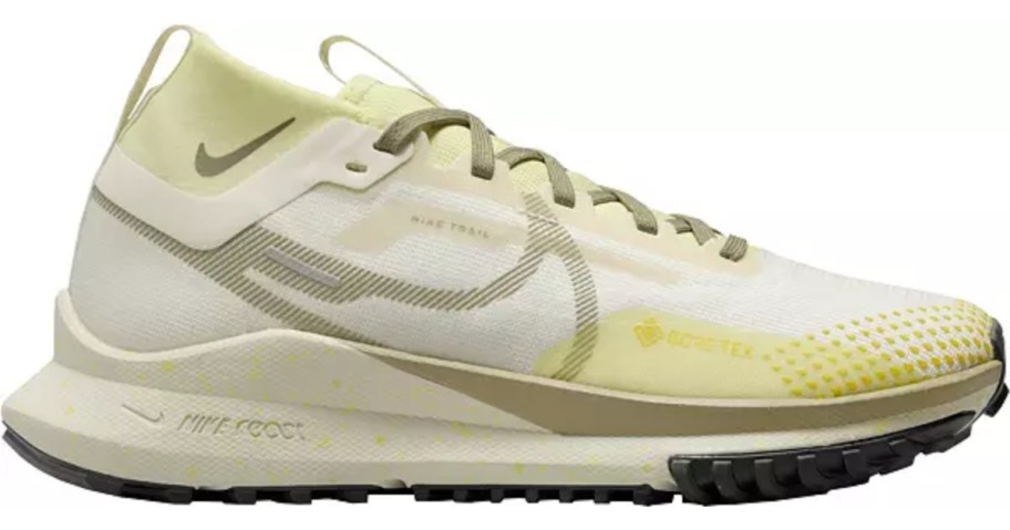 off white, tan and yellow women's Nike trail running shoe