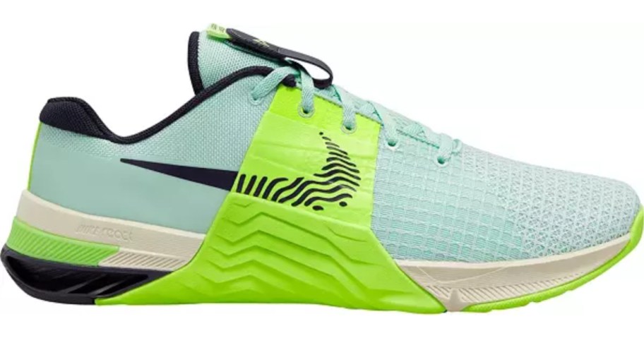 blue and yellow men's Nike running shoe