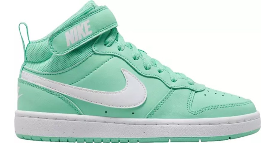 mint green and white Nike kid's mid shoe