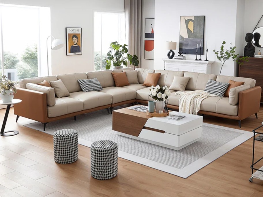 large corner sectional sofa in white and camel leather in a living room
