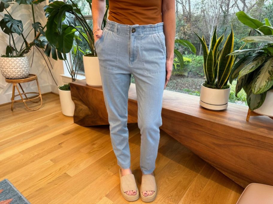 Woman wearing a pair of 32 Degrees Jeans