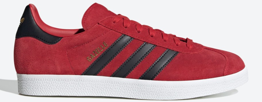 red suede adidas sneaker with black stripes
