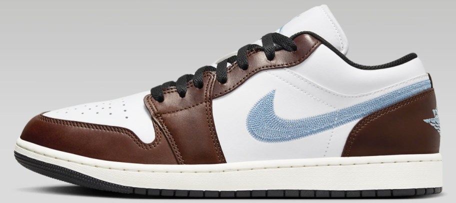 brown, white, and light blue nike sneaker