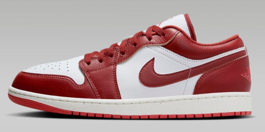 An Air Jordan 1 Low SE shoe in red and white