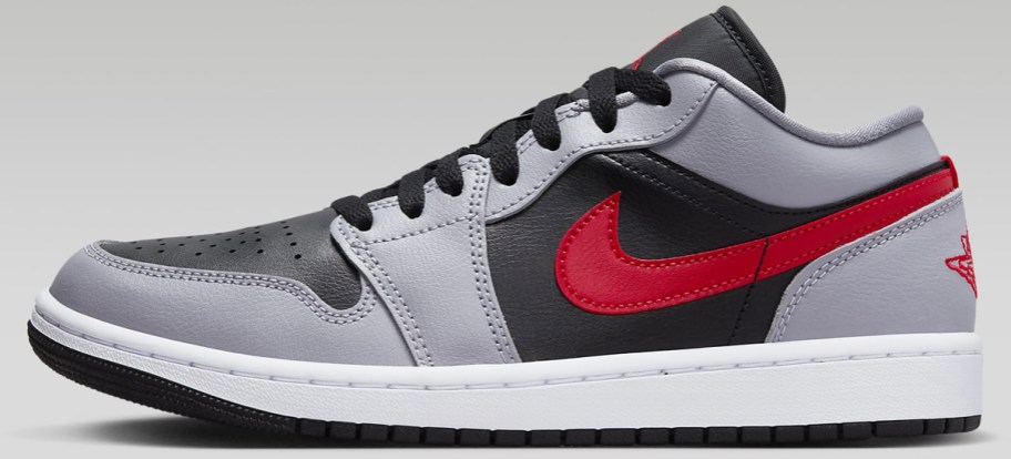 grey, black, and red nike sneaker