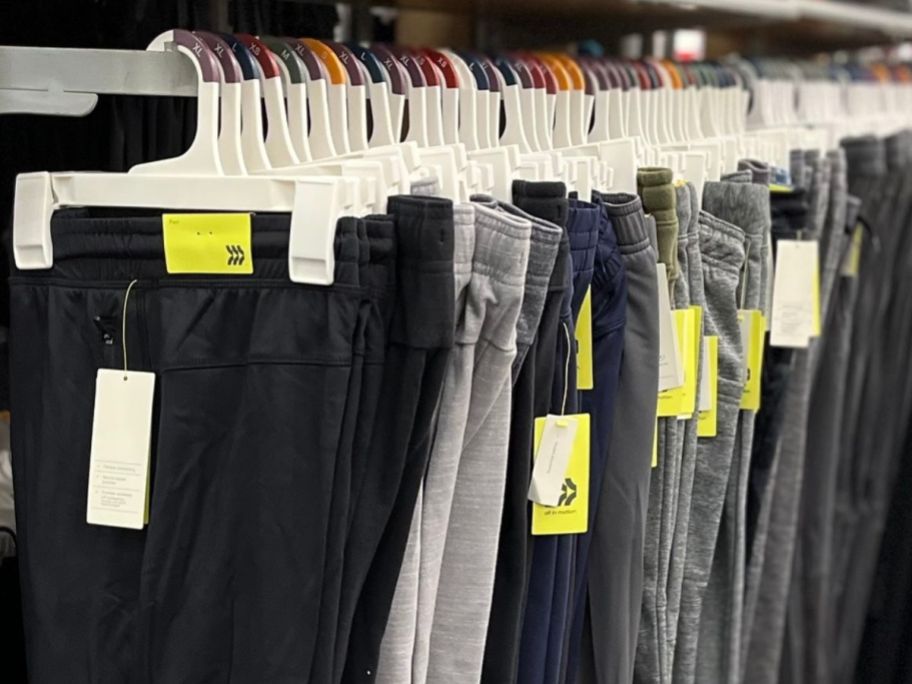All in Motion Men's Athletic Pants hanging on a rack at Target