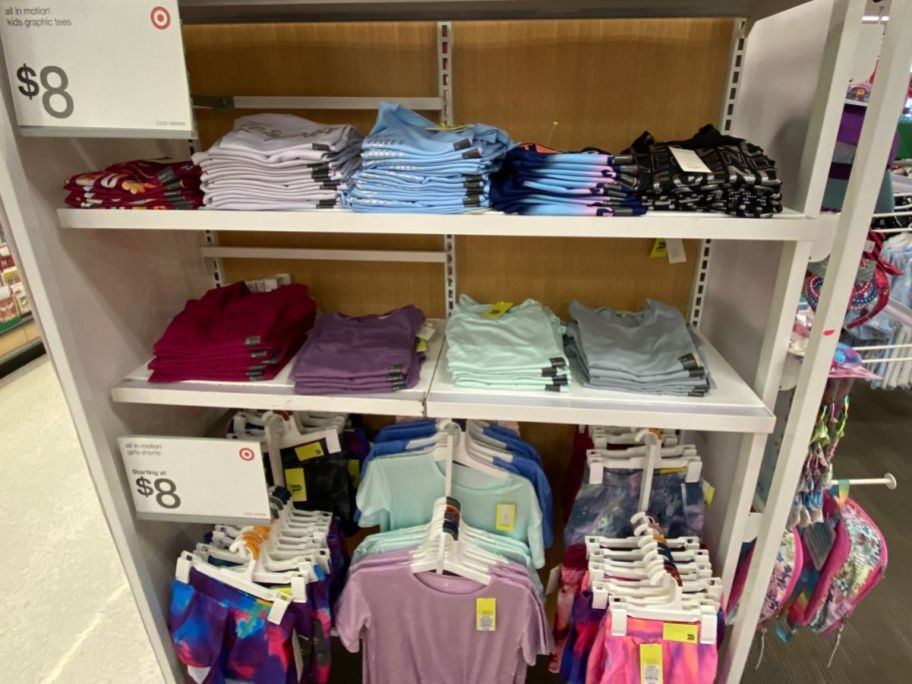 A display of All in Motion Girls Tees and Shorts at Target