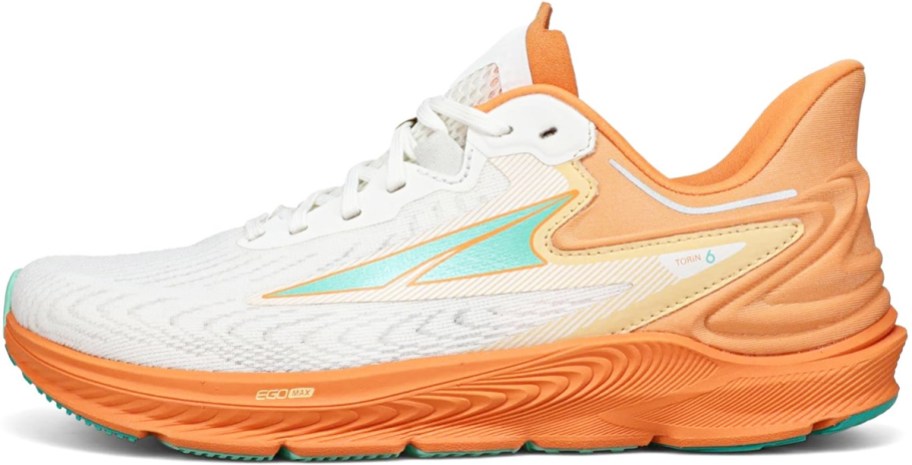 white and orange running shoe