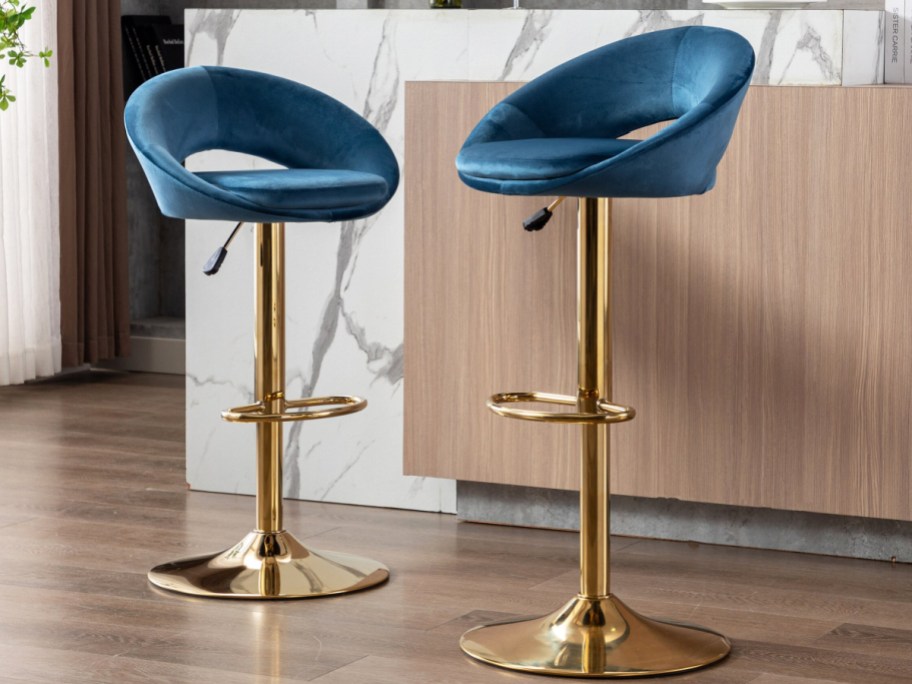 Blue and gold 2 piece barstool displayed at a home bar