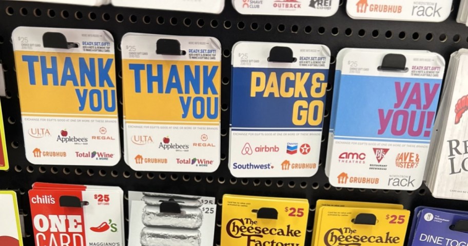 row of choice gift cards hanging in store