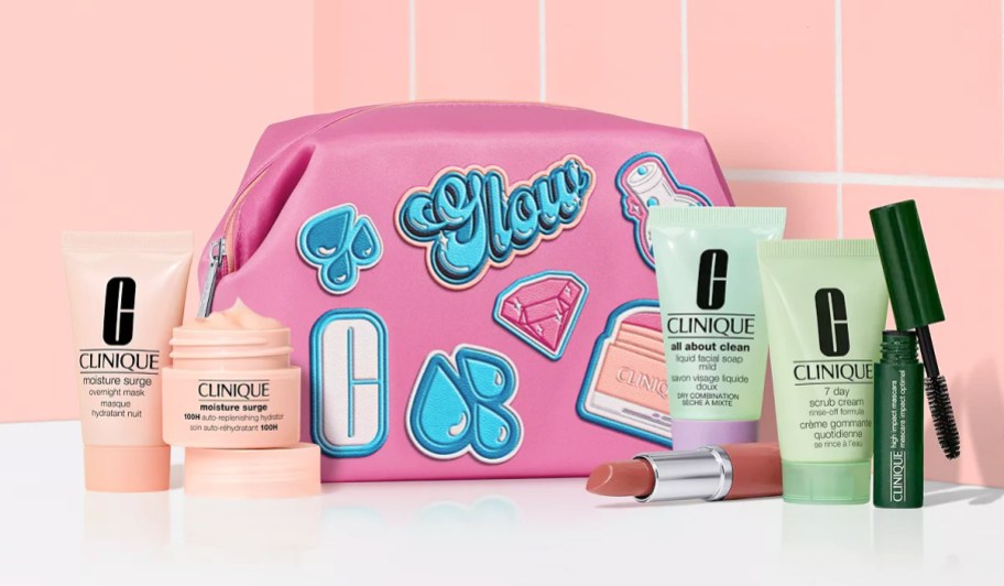 Clinique cosmetics and skin care products and an embellished pink bag