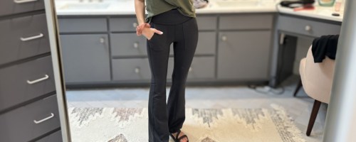 woman wearing aerie flare leggings in black