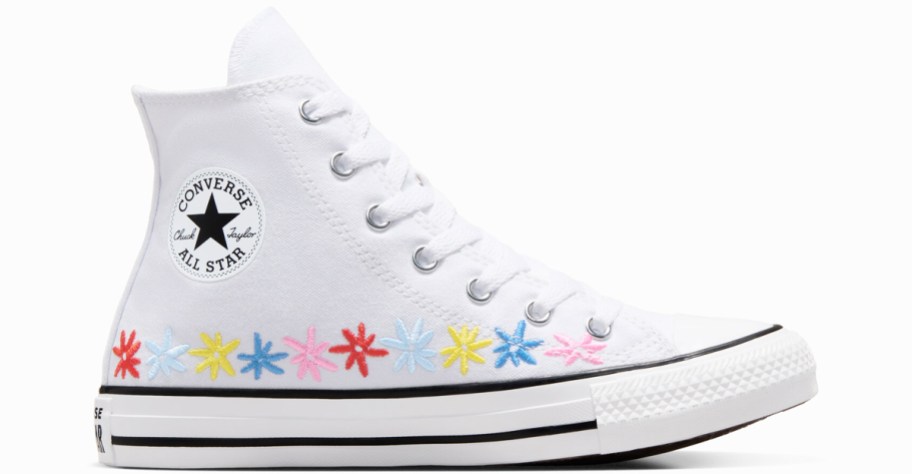 white converse high top with multi colored flowers along the bottom
