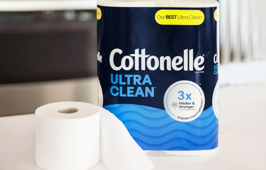pack of Cottonelle Ultra Clean Toilet Paper with roll in front of it