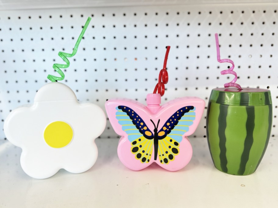 flower, butterfly, and watermelon sipper cups with twisted straws