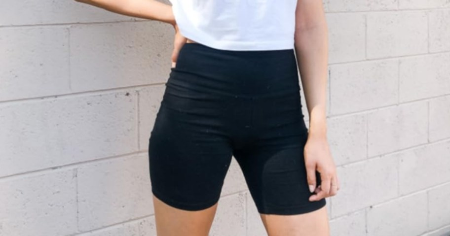 woman wearing high waisted bike shorts in black
