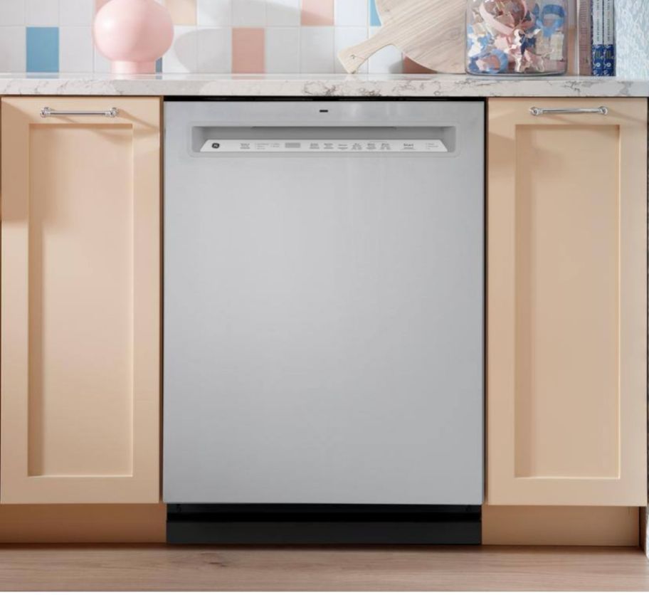 a built-in stainless steel dishwasher installed in a kitchen