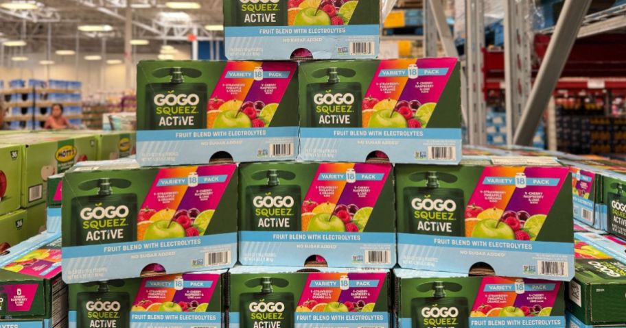 A tower of GoGo squeeZ Active Fruit Blend with Electrolytes boxes 