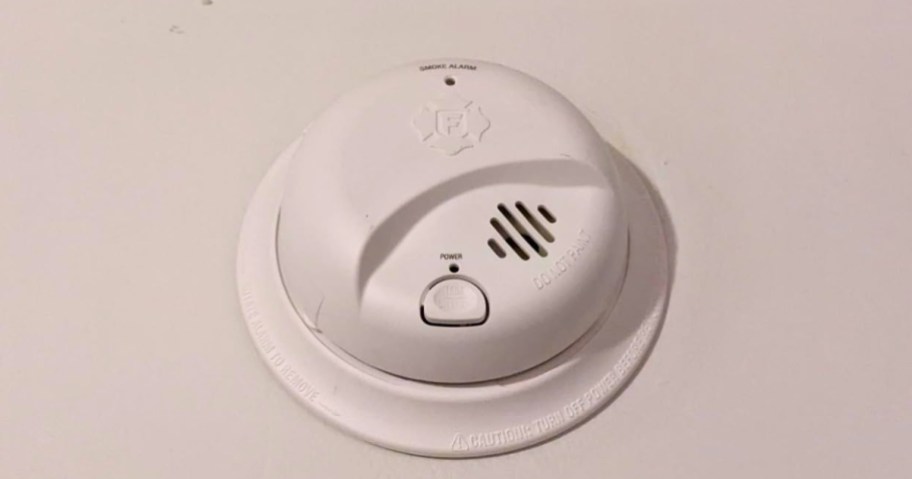white First Alert Battery Operated Smoke Alarm on ceiling