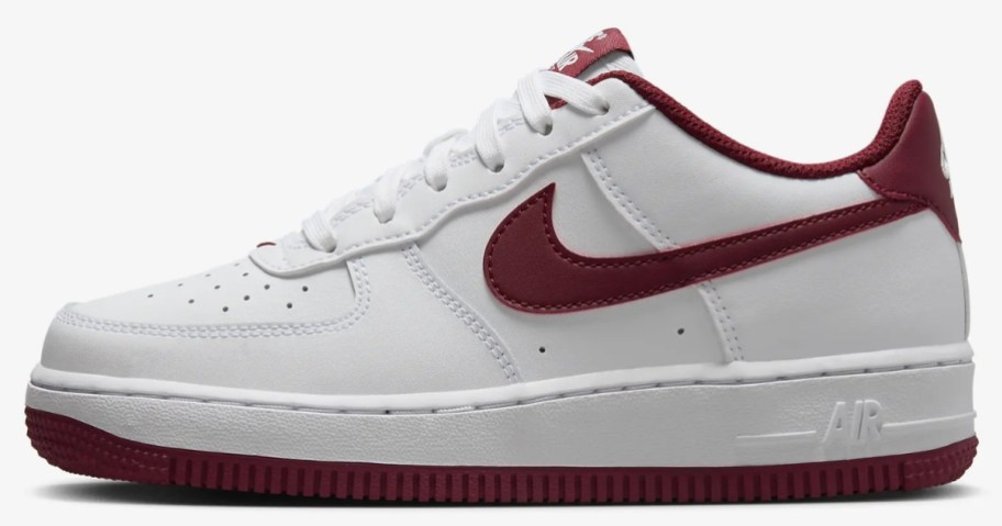 white and red Nike Air Force 1 kids shoe