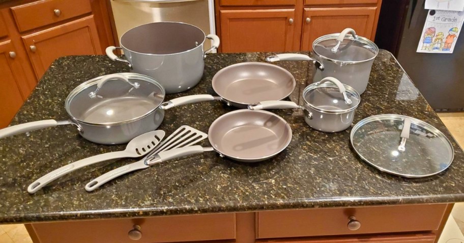 a set of cookware on a kitchen island