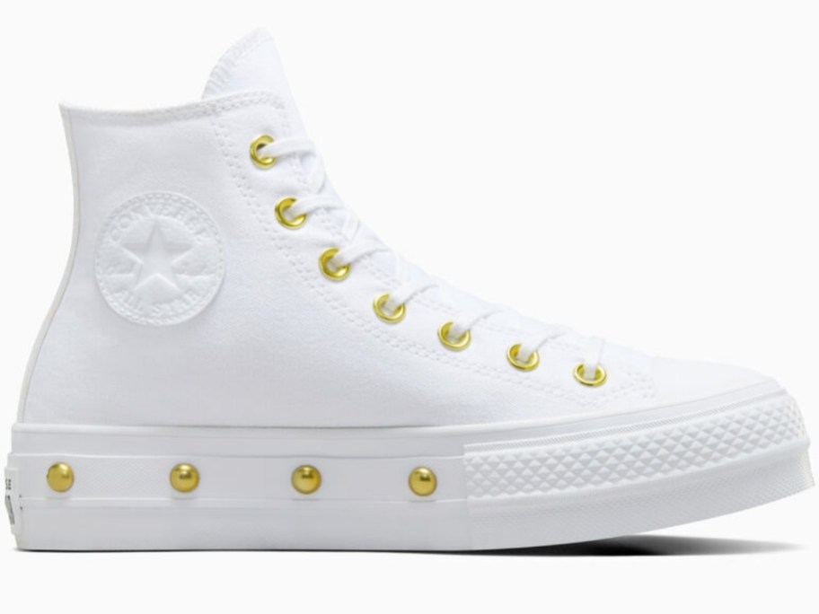 women's white high top platform Chuck Taylor shoe with gold stud accents
