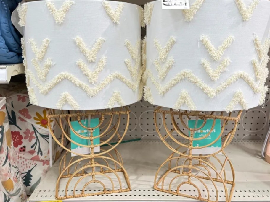 rattan and boho table lamps on shelf