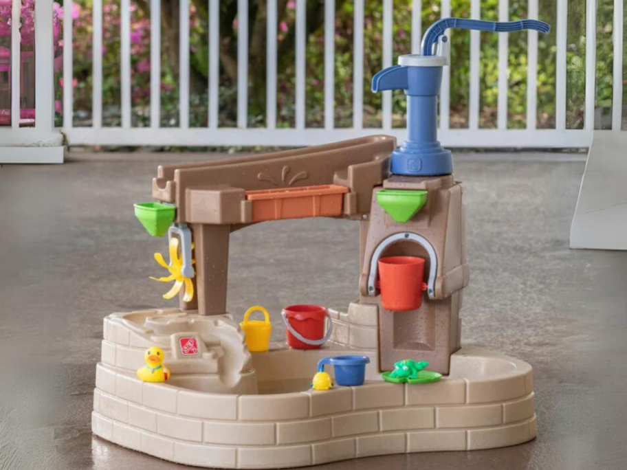 kid's water table, splash pond play set on a back deck