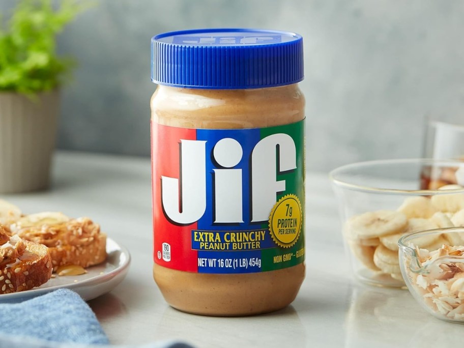 jar of Jif Extra Crunchy Peanut Butter on a counter