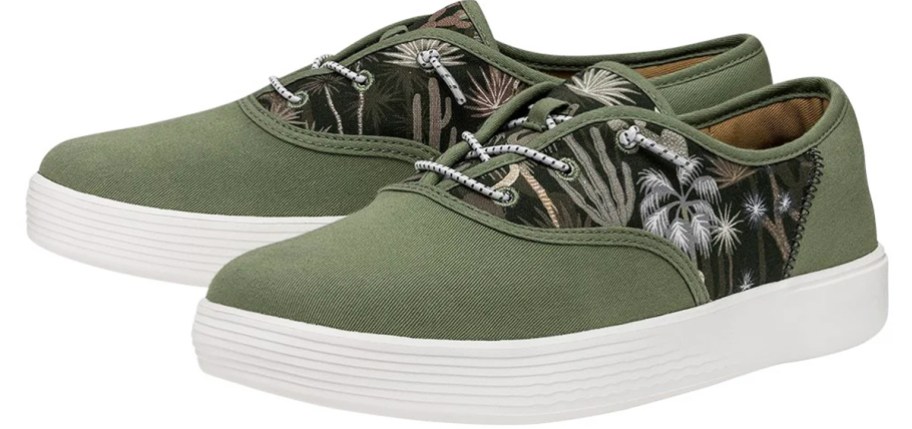 pair of green and palm print sneakers
