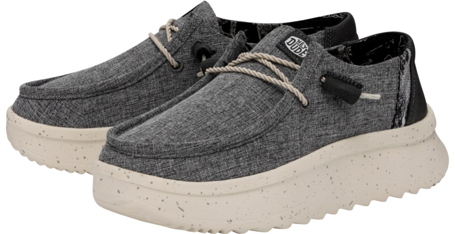 pair of grey platform sneakers