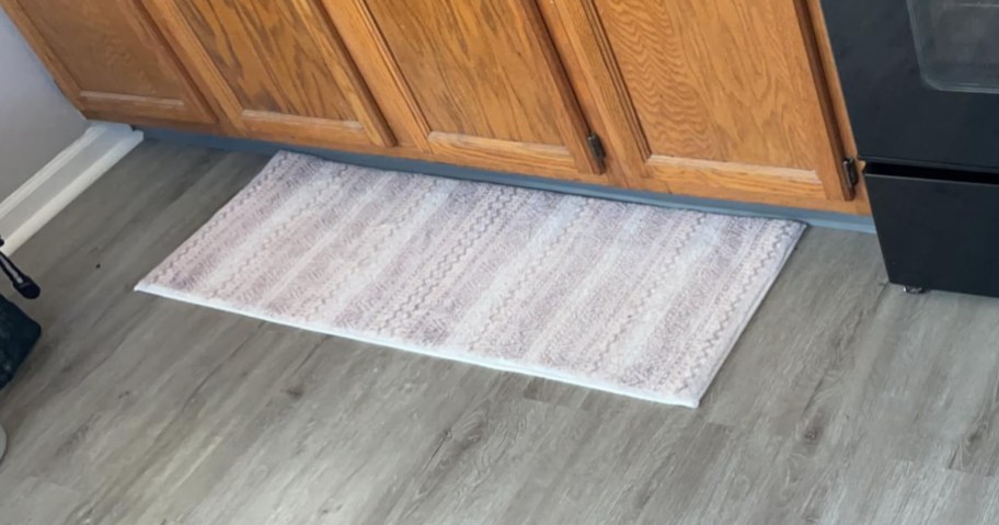 striped runner on gray kitchen floor
