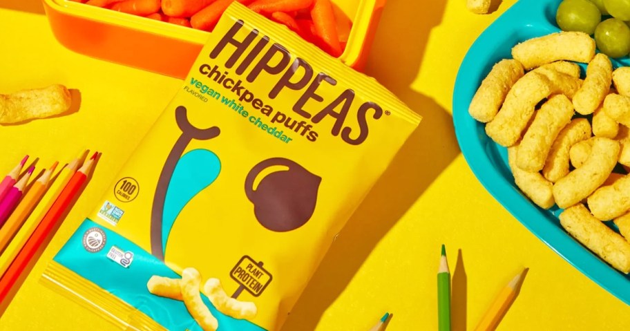 yellow bag of Hippeas Chickpea Puffs near school lunches