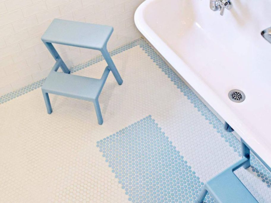 A bathroom with Merola Tile Metro Penny Matte Light Blue Porcelain Mosaic Tile 