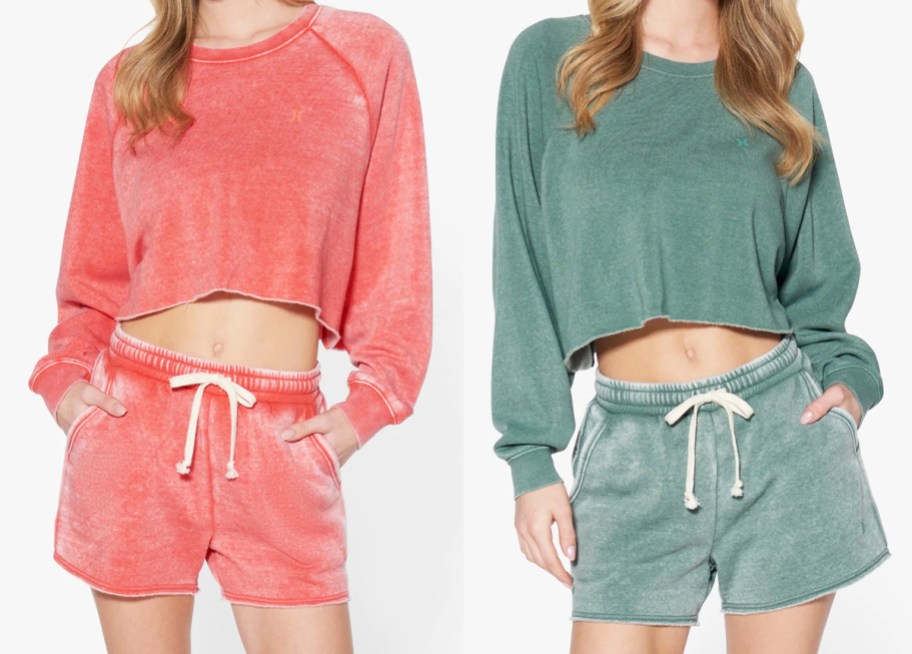 two women in red and green matching cropped sweatshirt and short sets