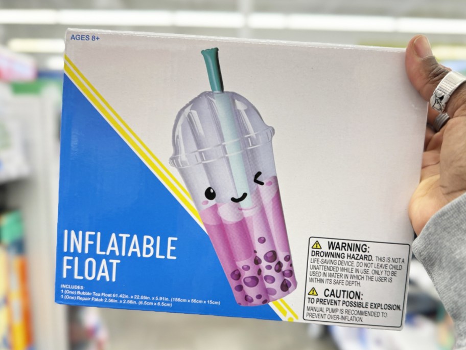 hand holding up a bubble tea drink shaped pool float