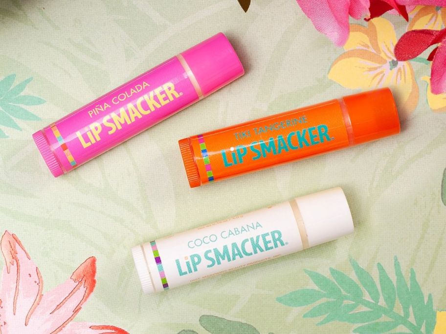 3 Lipsmackers flavored lip balm in Tiki Tangerine, Coco Cabana, and Pina Colada flavors.