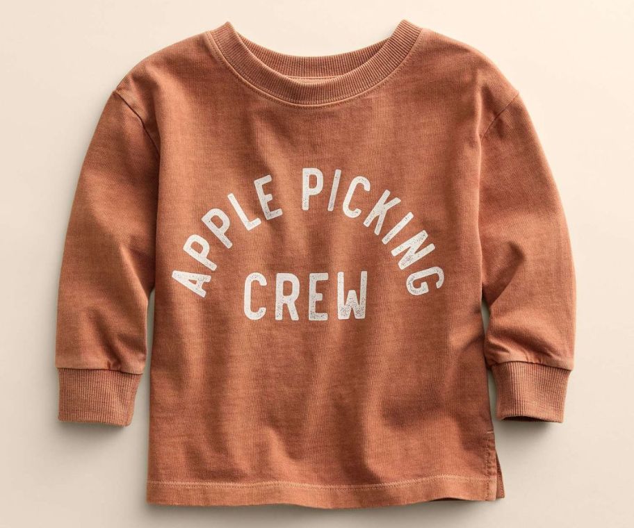 a baby's tee shirt with the words apple picking crew across the front