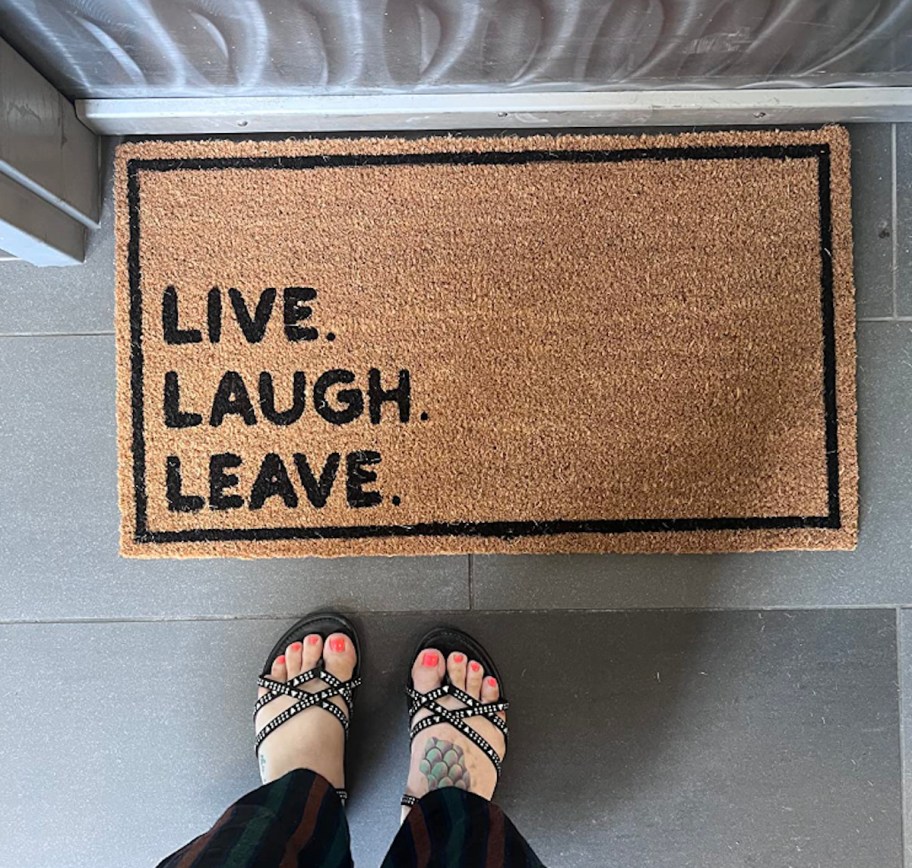 live laugh leave doormat on concrete