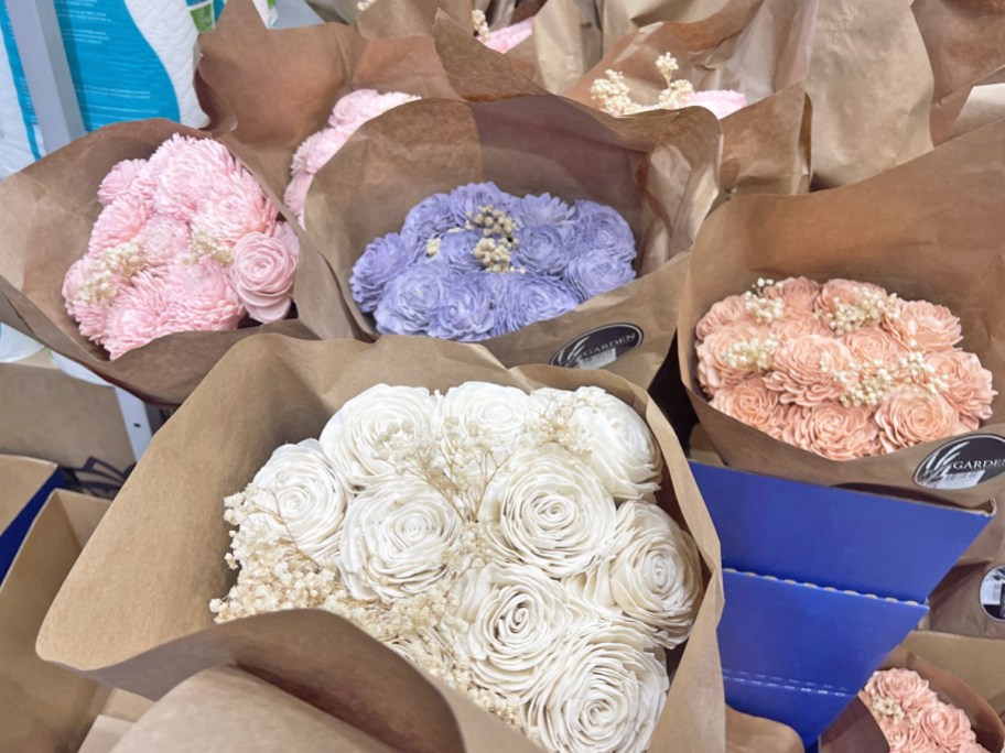 white, pink, purple, and orange bouquets of paper flowers